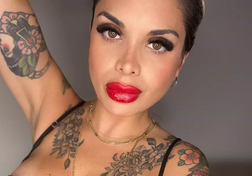 showing off my full lips with this red lipstick
