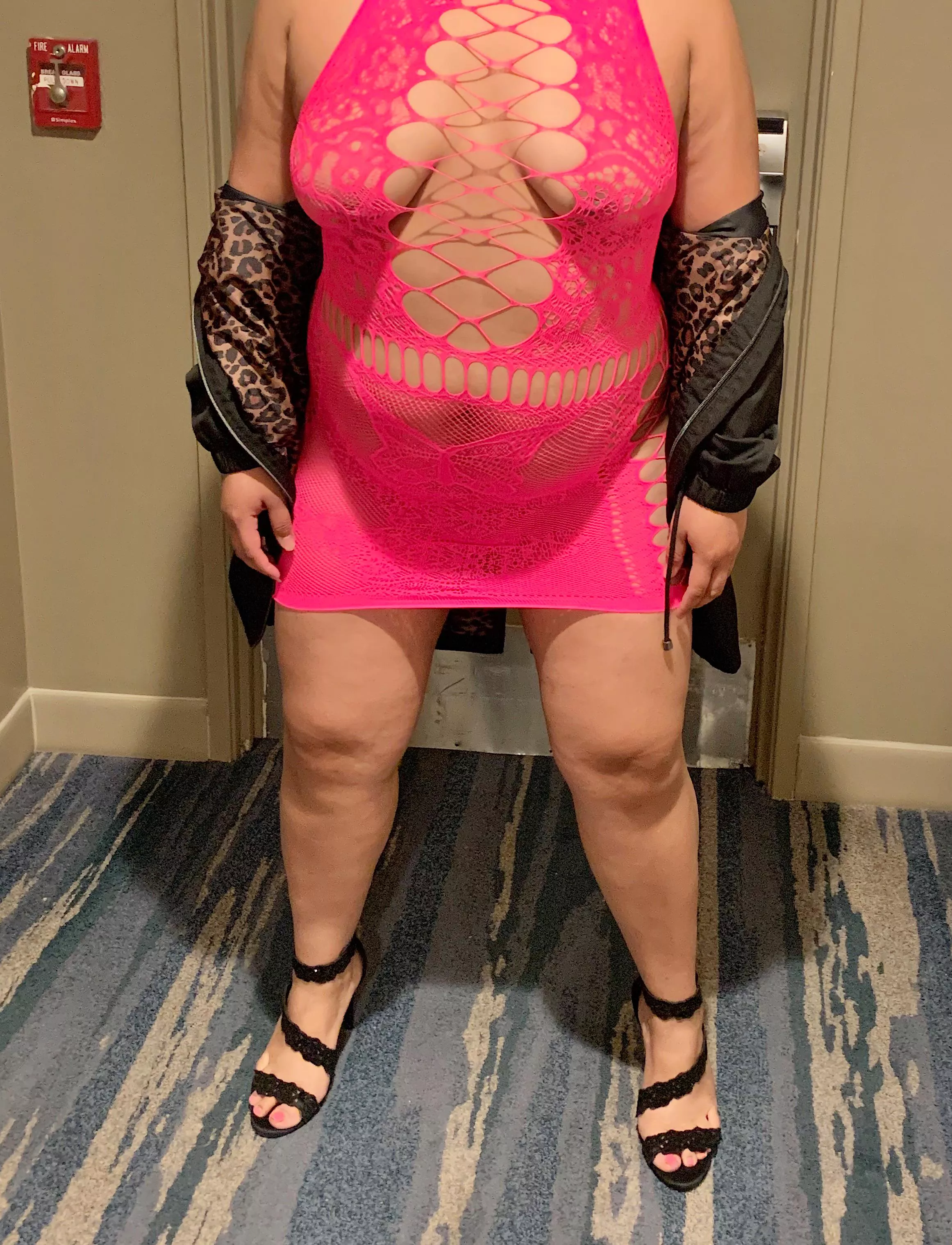 Teasing in a hotel hallway