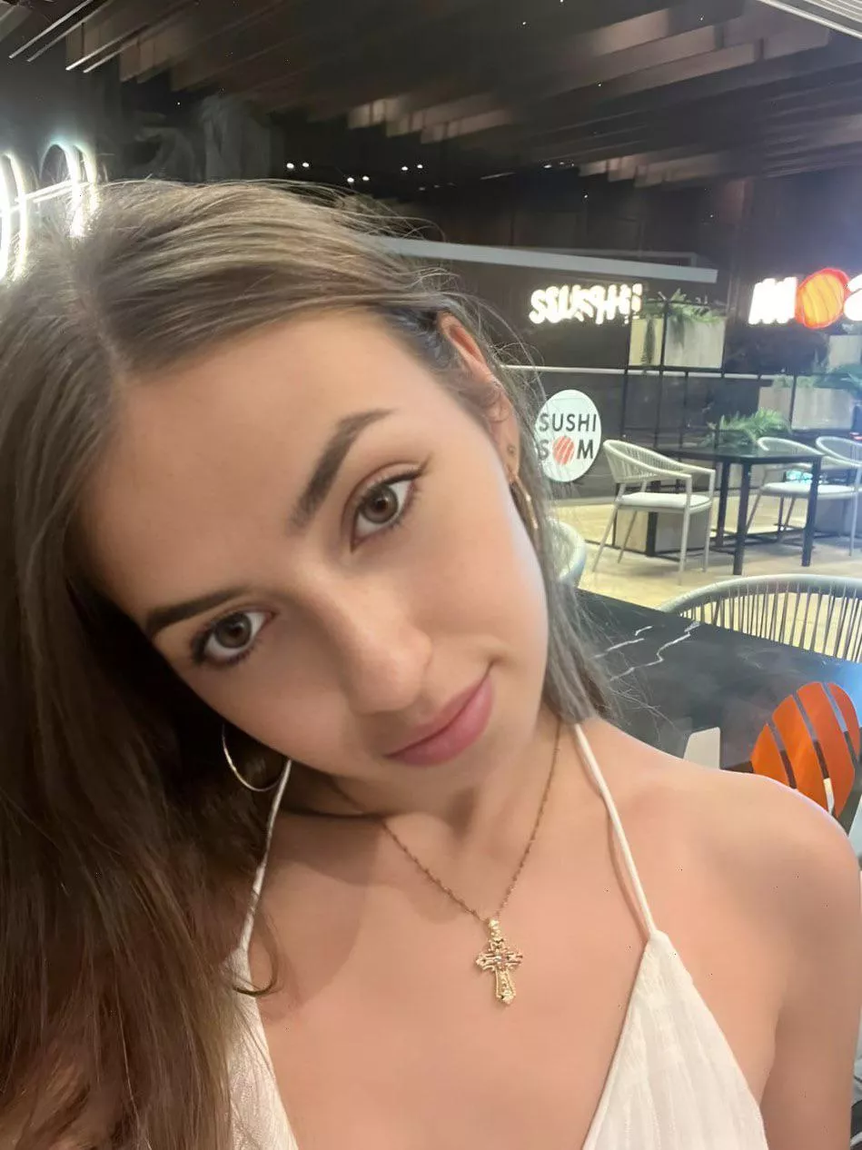 a brunette out eating some shushi