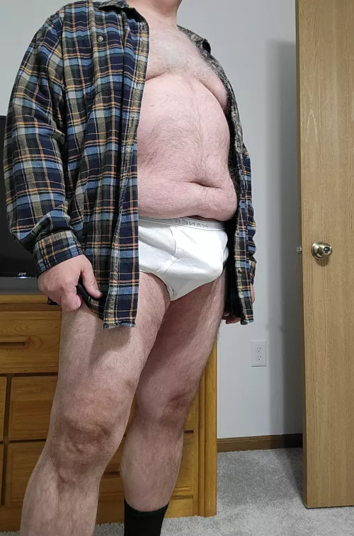 Age 57. Flannel and white Hanes...too 