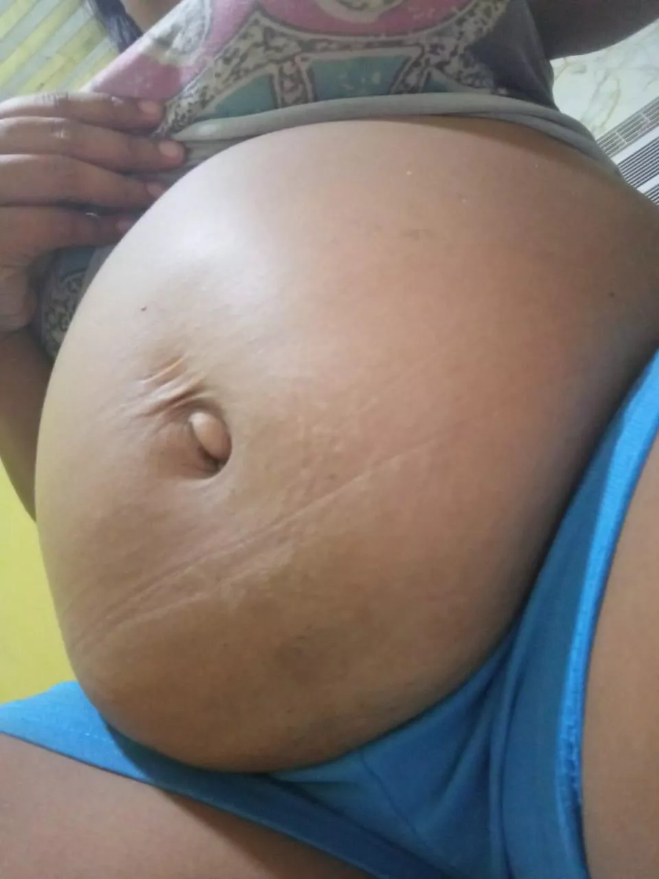 Describe my belly in one word