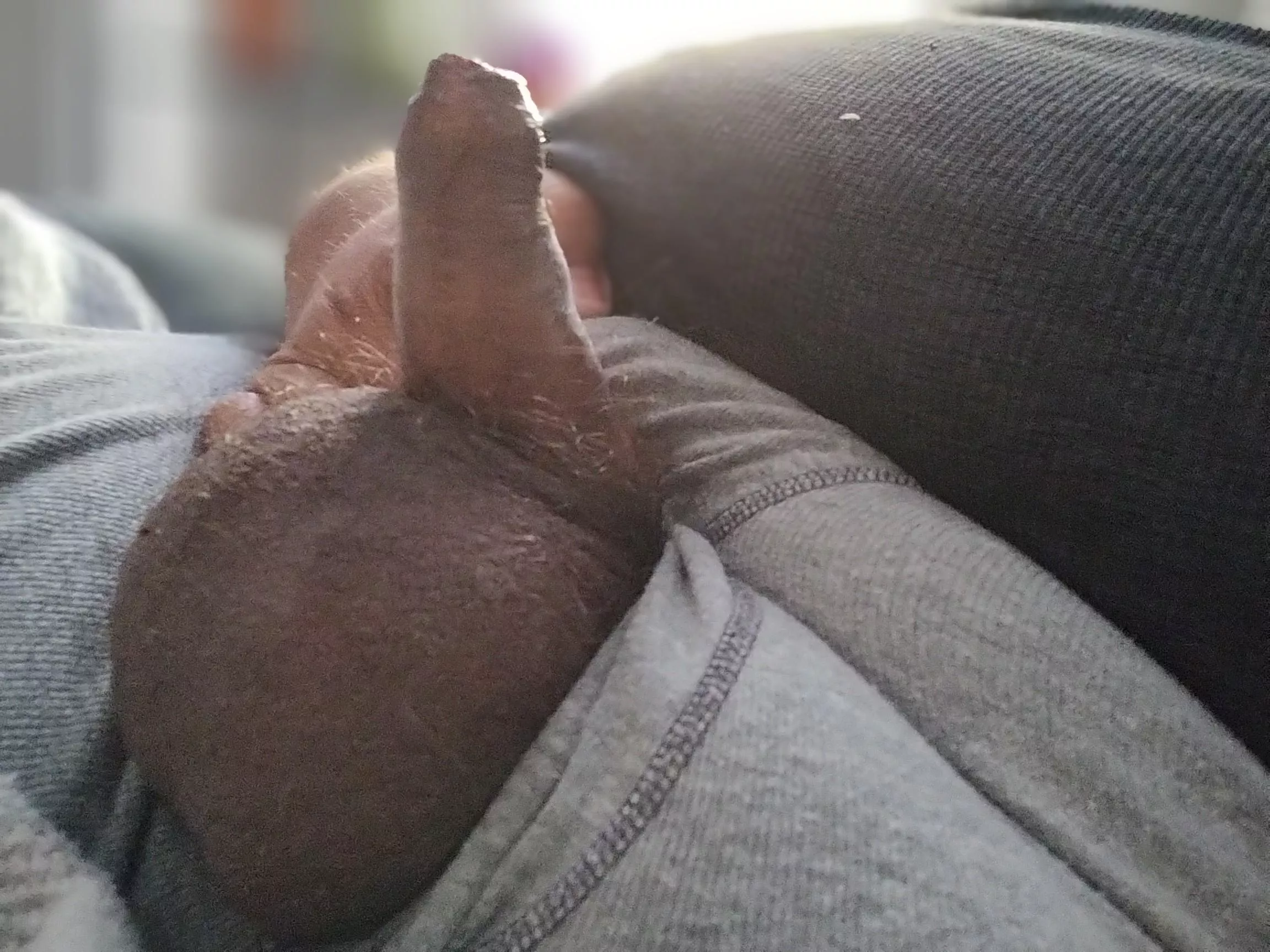 Hiding underneath daddy's big belly 