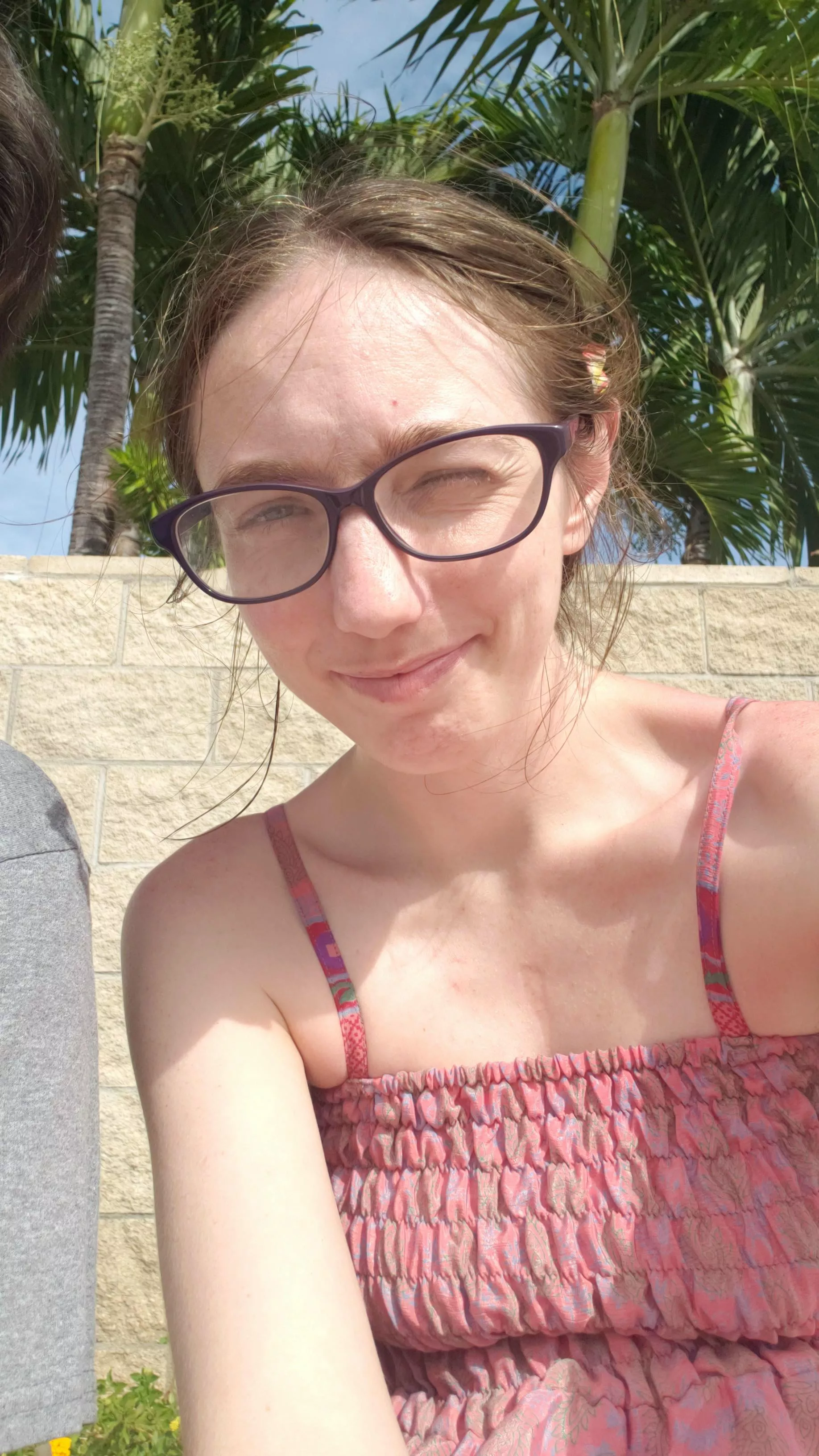 Just an average girl getting cooked in the sun while waiting for the trolly