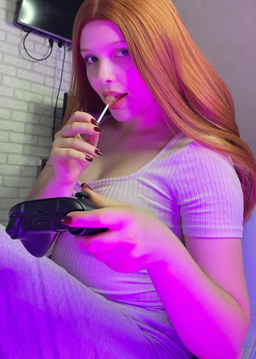 redheaded hottie licks chupapchups passionately