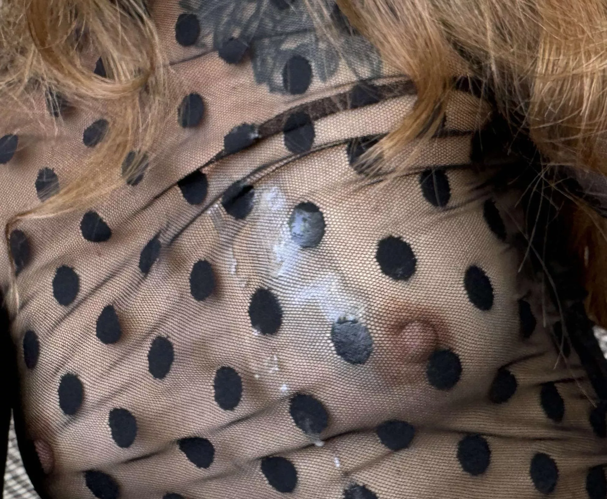 Semen seeps through my clothes and onto my chest