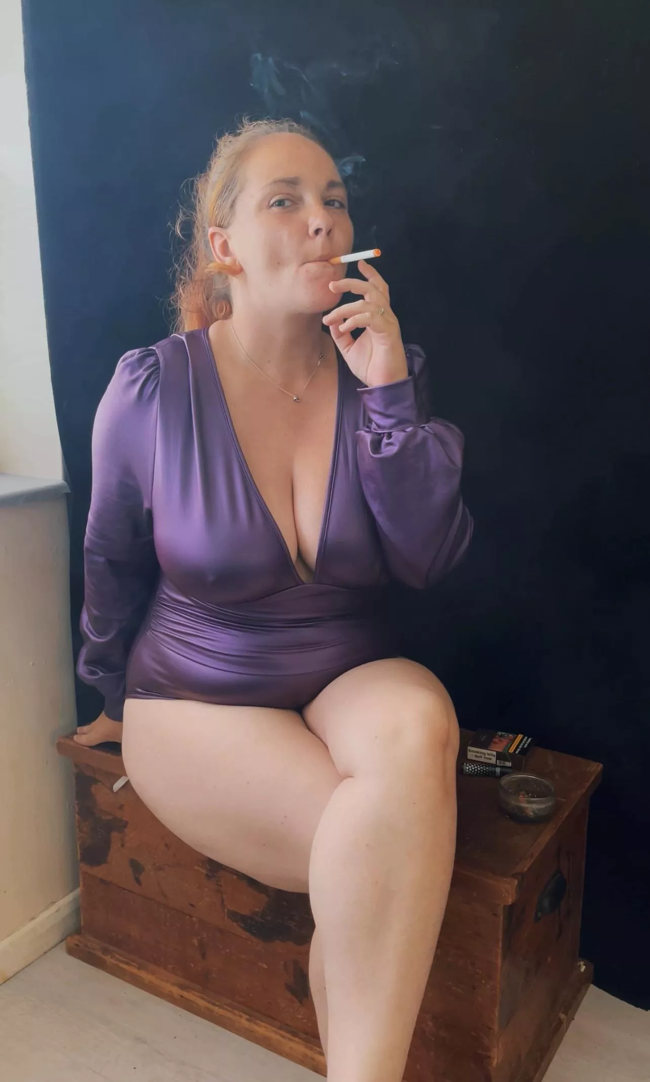 Smoking in shiny purple