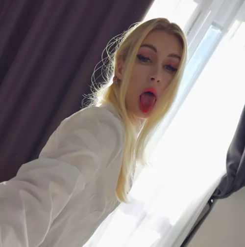 Just a small girl with a huge tongue