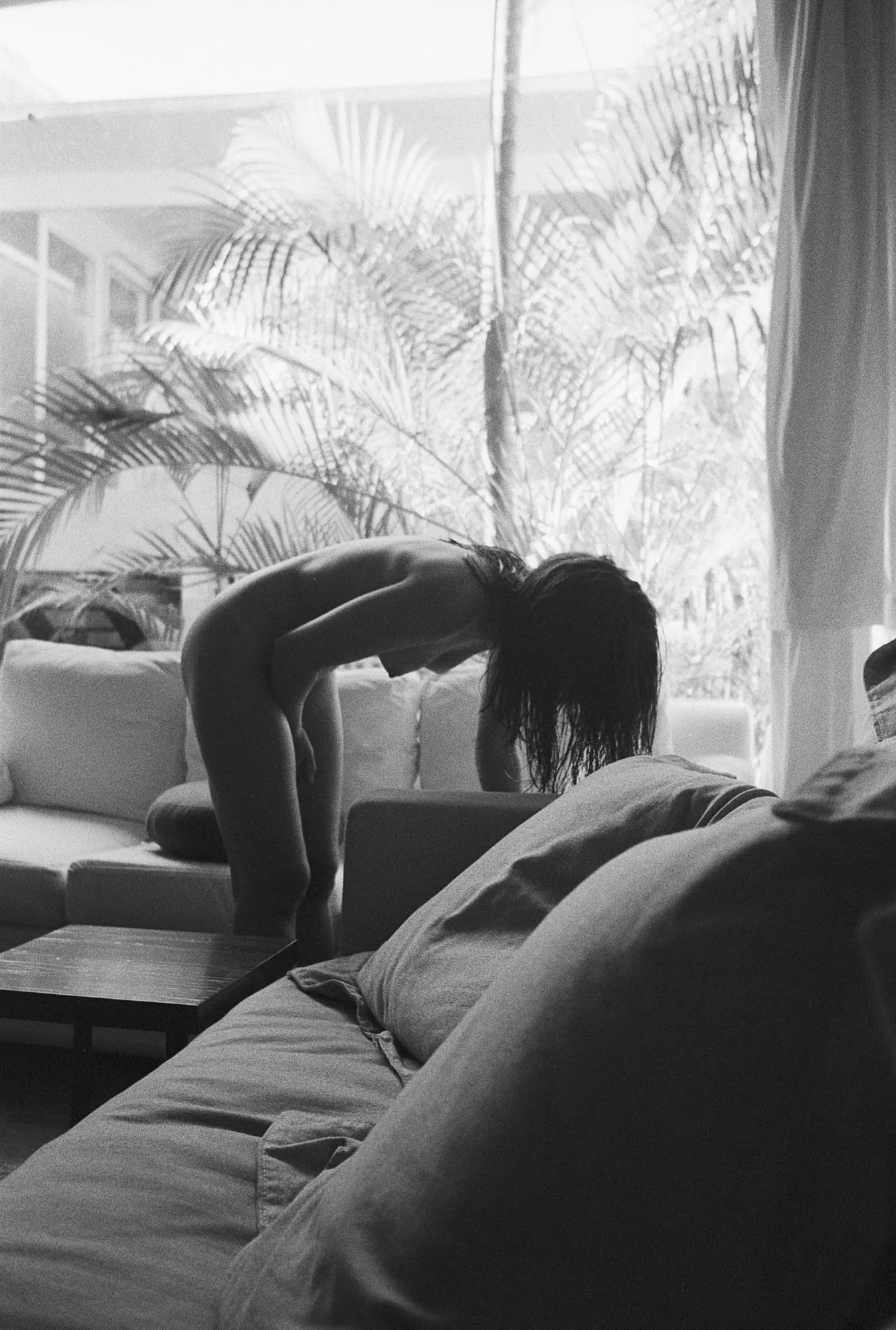 Putting on some music on Spotify (Nikon F3, HP5+, OC)