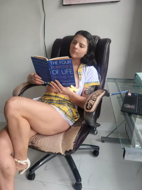 Reading with my blouse wide open. Do you think anyone is home?