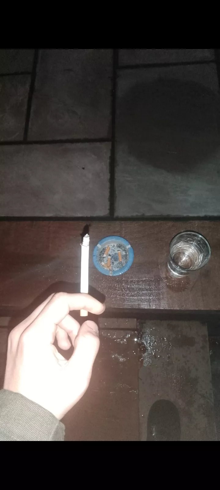 Smoking a cigarette at 1am in the morning after smoking a cigarette at 1am in the morning