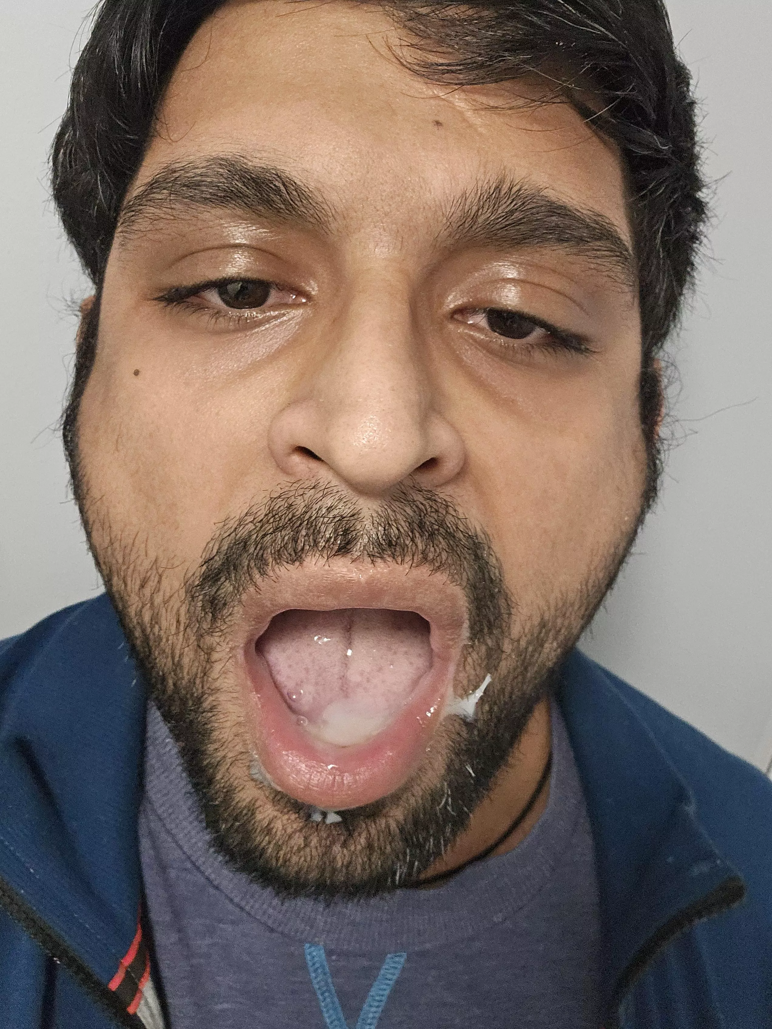 In a strangers bathroom. Gave him head in the basement. I can't stop getting facials and walking in public afterwards 