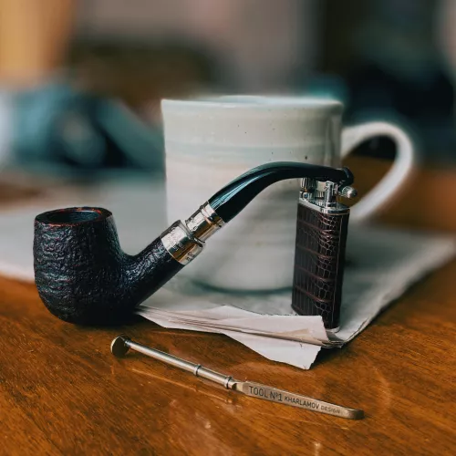 Morning coffee and a pipe of tobacco.