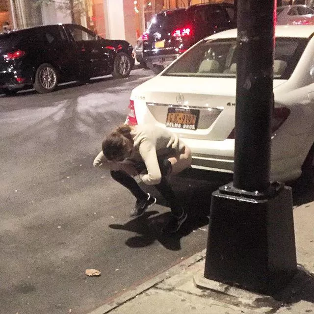 On the street at the back of a car