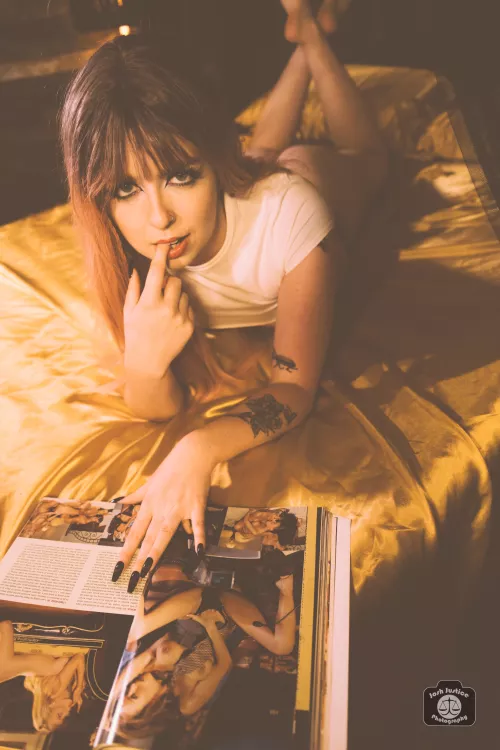 Reading it for the articles. Model: Dirty Shirley (OC)