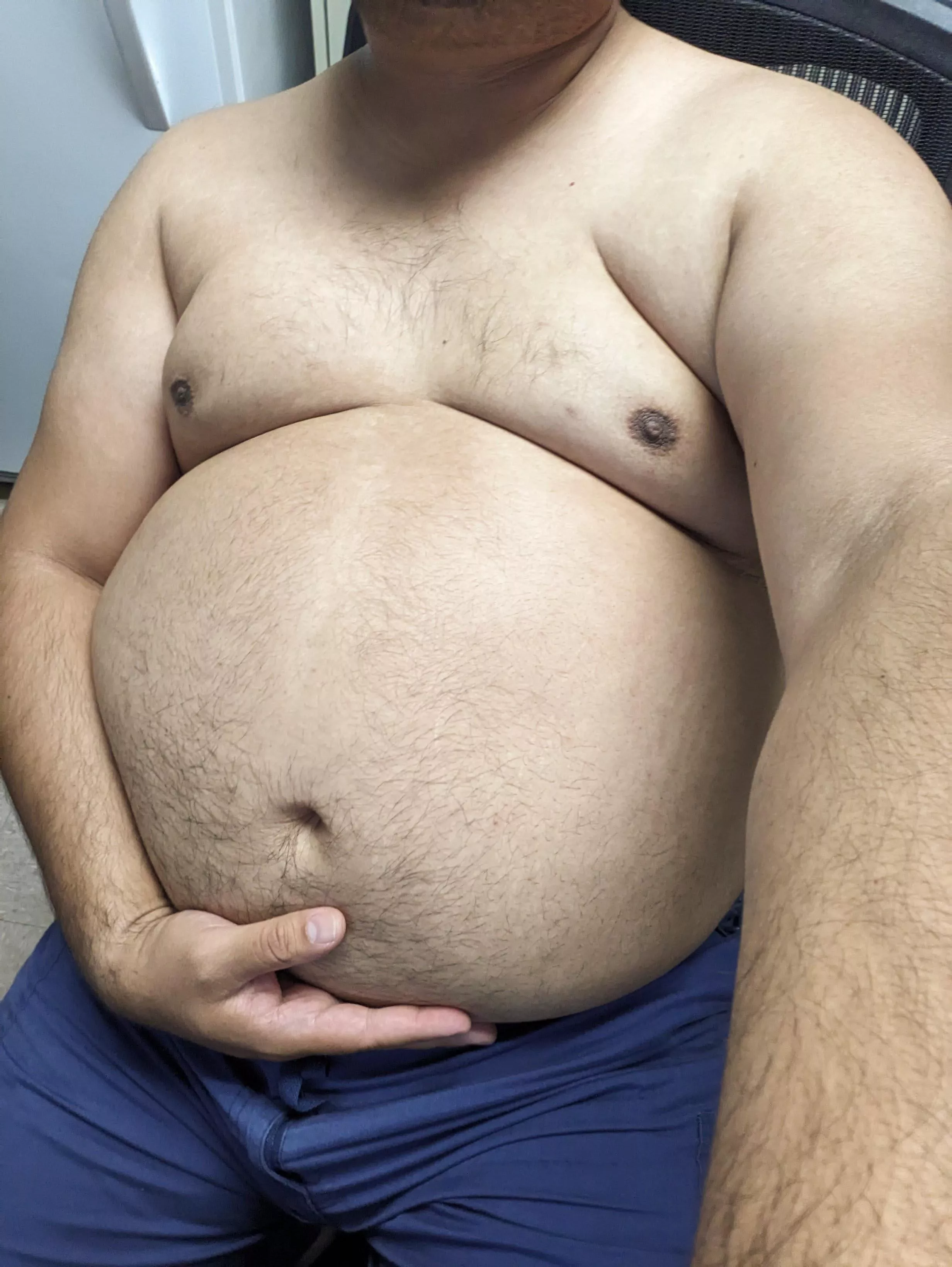 Stuffed and shirtless at work