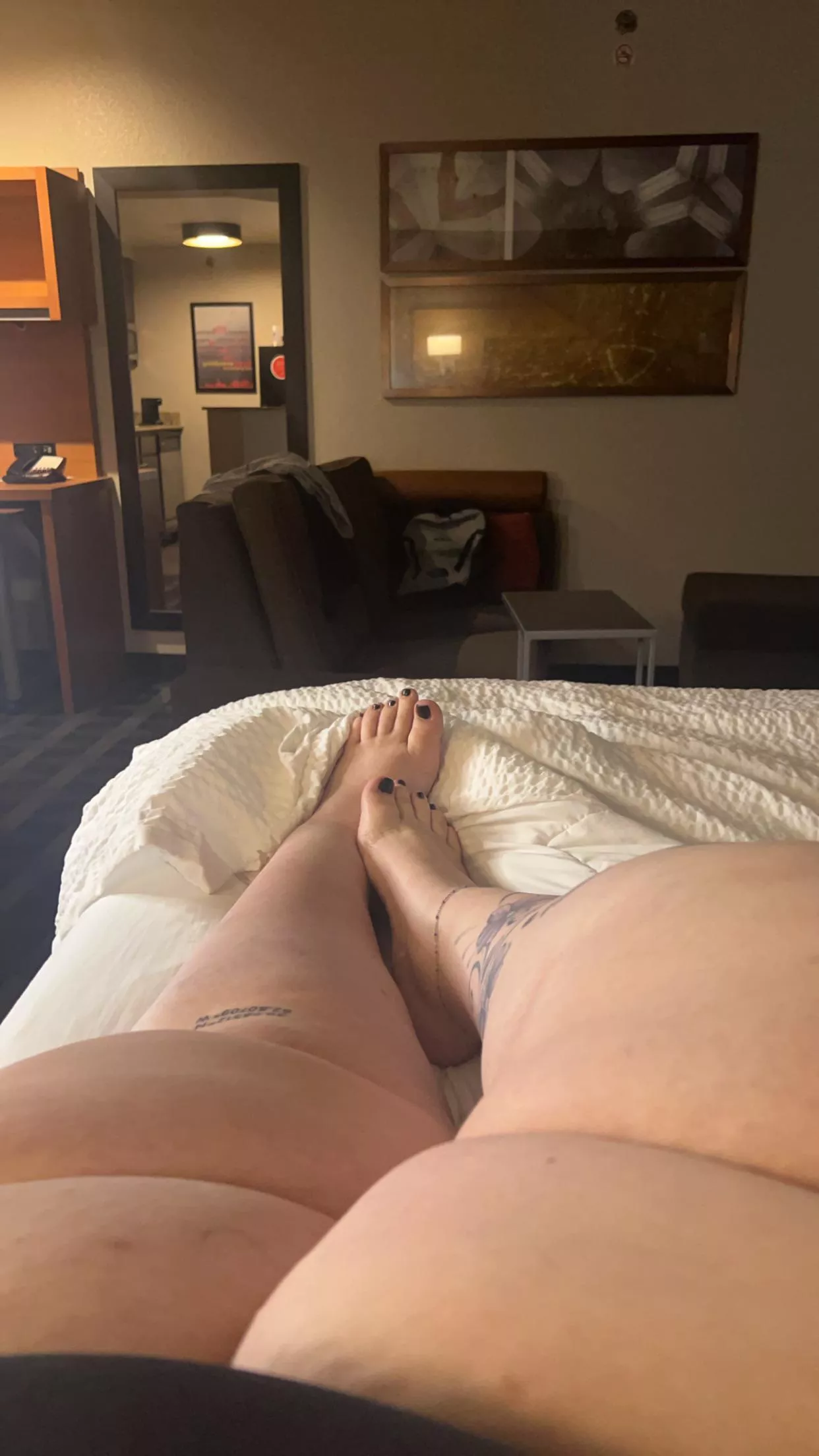 Tatted, fresh pedi, thick ass thighs. What more could you want?