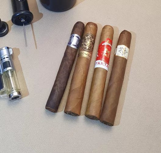 The menu for last week: inexpensive sticks (~$9) I have never had before. Only one winner I'll buy again, ROOM101 Doomsayer. Great smoke for $9 at local b&m. Other sticks from Room101 to try? 