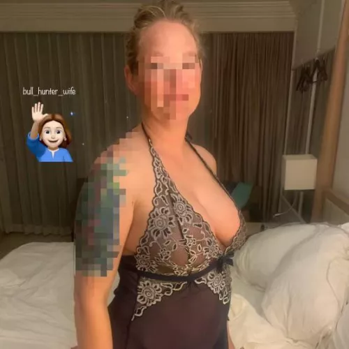 We make arrangements to cuck my husband.  You, my new bull, come in the hotel room to find him sitting quietly on the couch, and me waiting on the bed.  