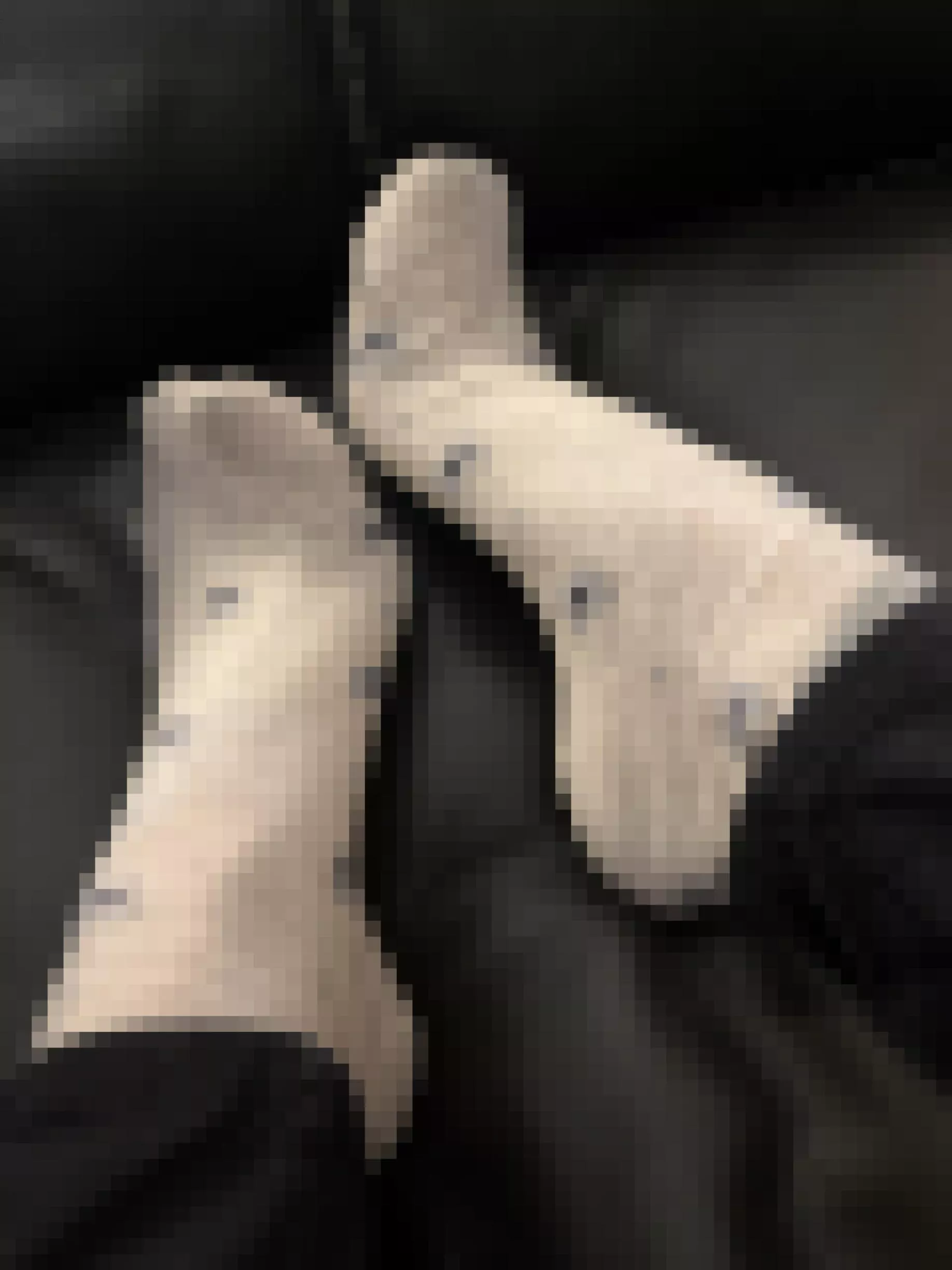 Day 24 of socktober - grey socks on a black leather sofa 🩶