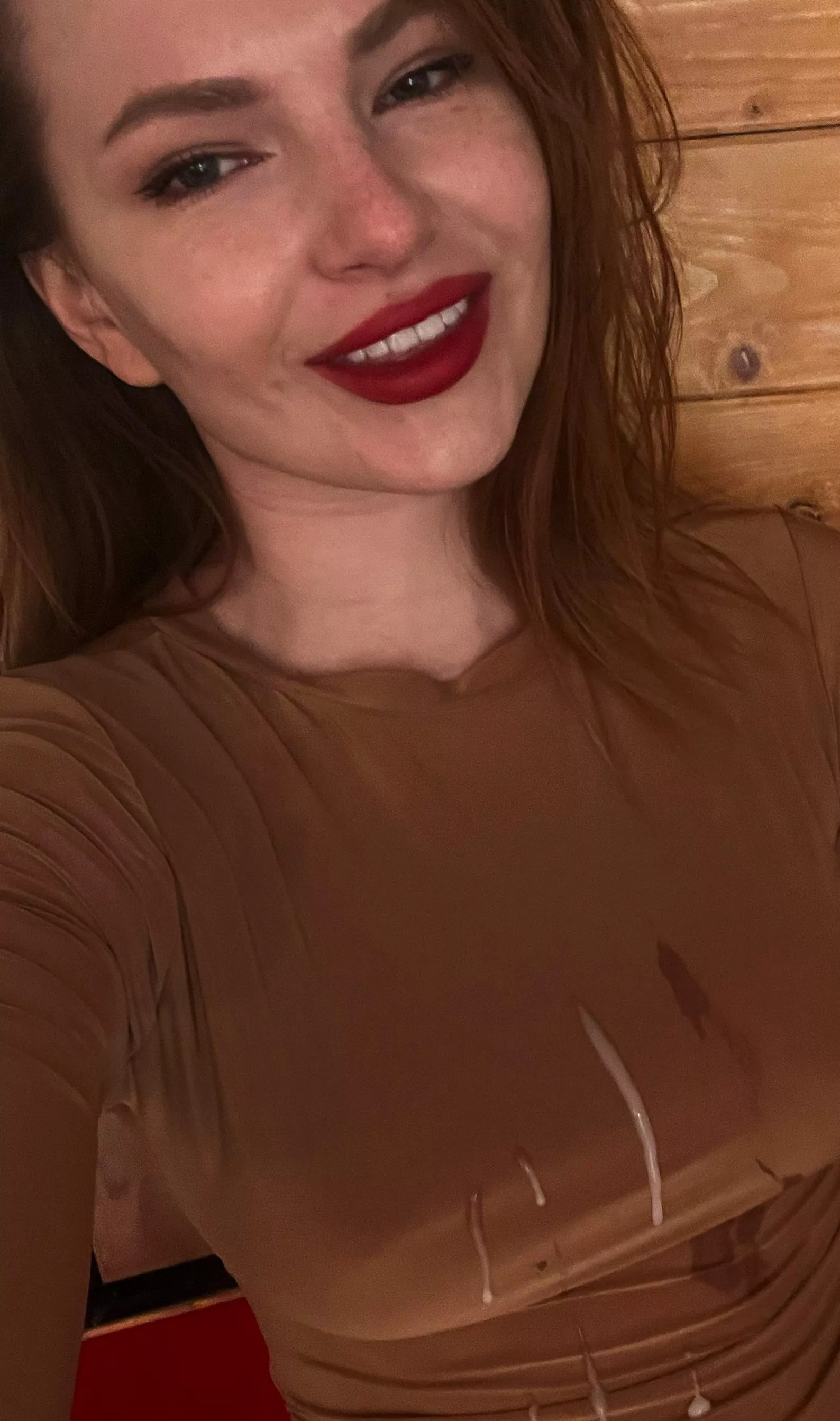 sexy brunette taking selfies