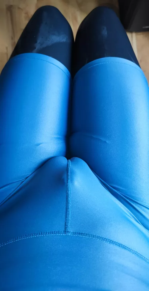 Blue shorts over black latex is great.. 🐶🫣
