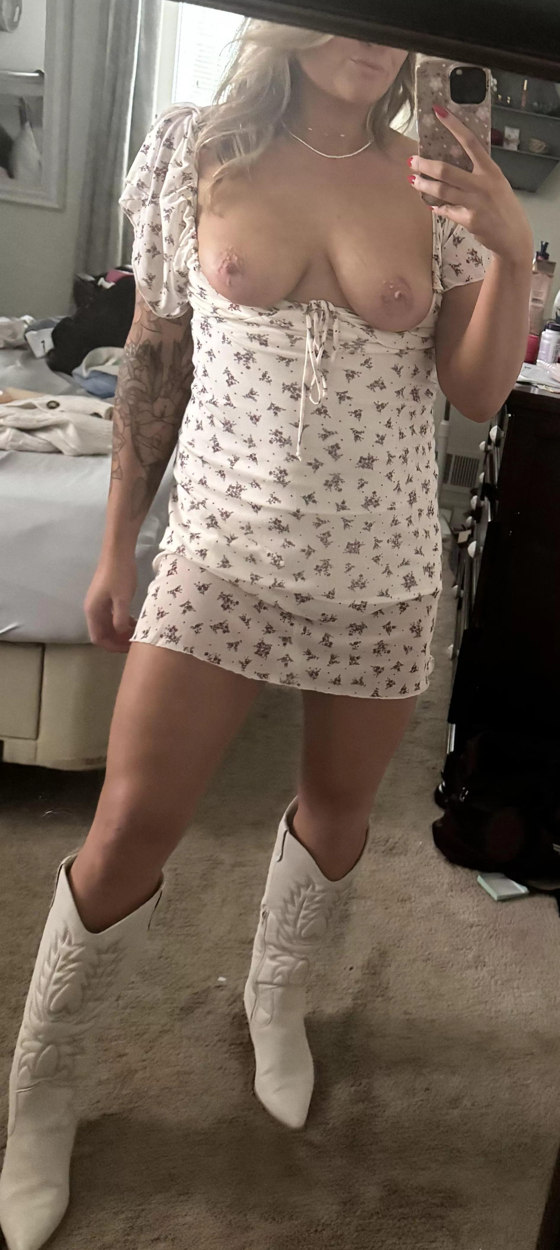 Boots and boobs, is that a good combo? 