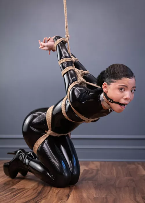 Looking at this pretty woman asking for help. If she asked you to remove her gag, what would you have done? 