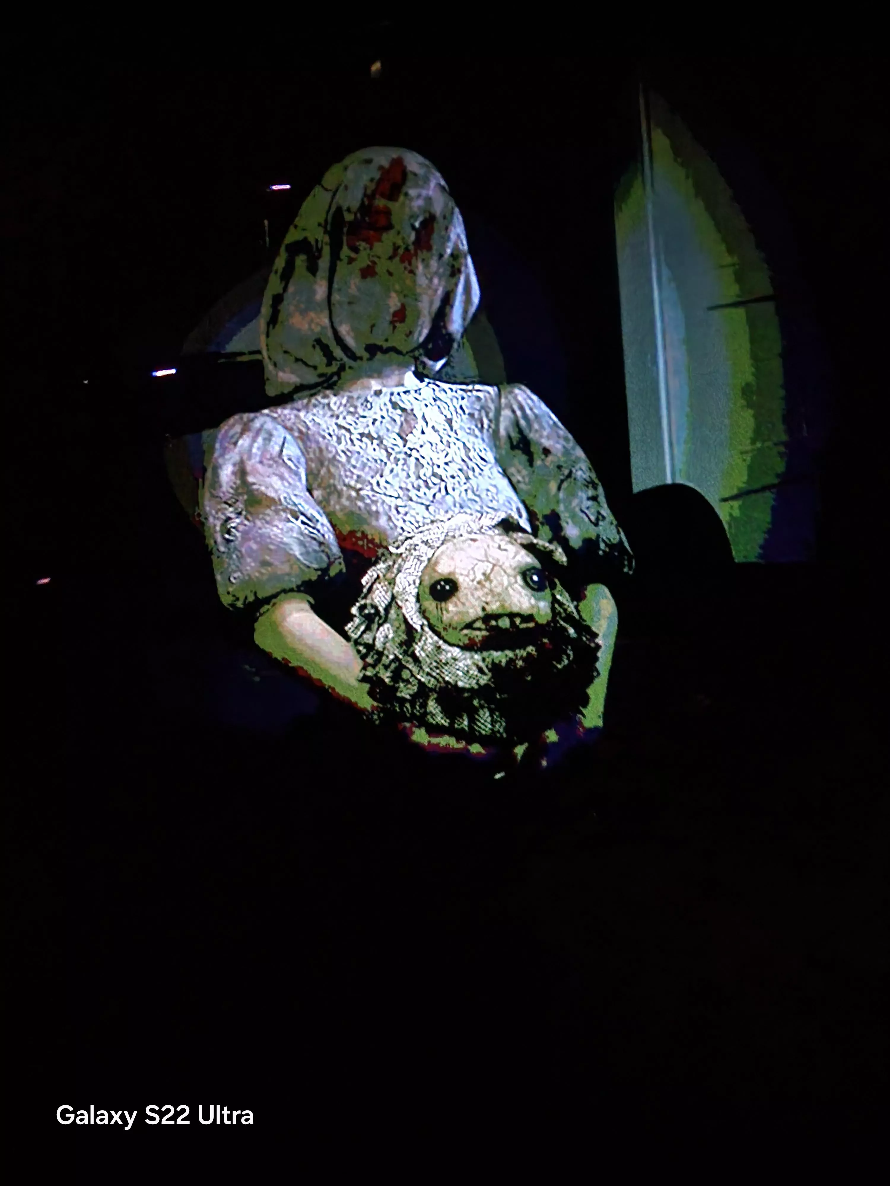 I posted a question about this ghost girl so I replayed and took a pic of her to see if our house is haunted or its a easter egg because it was weird to pop up so who is she or is it a ghost to be learned about later ?