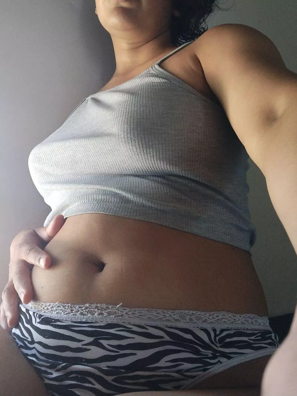 My inflated belly highlights my deep belly button