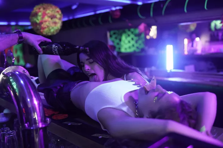 Nothing better than drinking champagne from her belly button