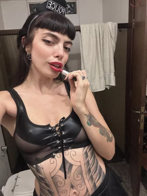 Polished, poised, and ready to patrol the Halloween scene.