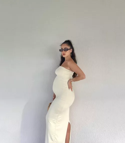 Pregnant Alesia Limongelli in white dress
