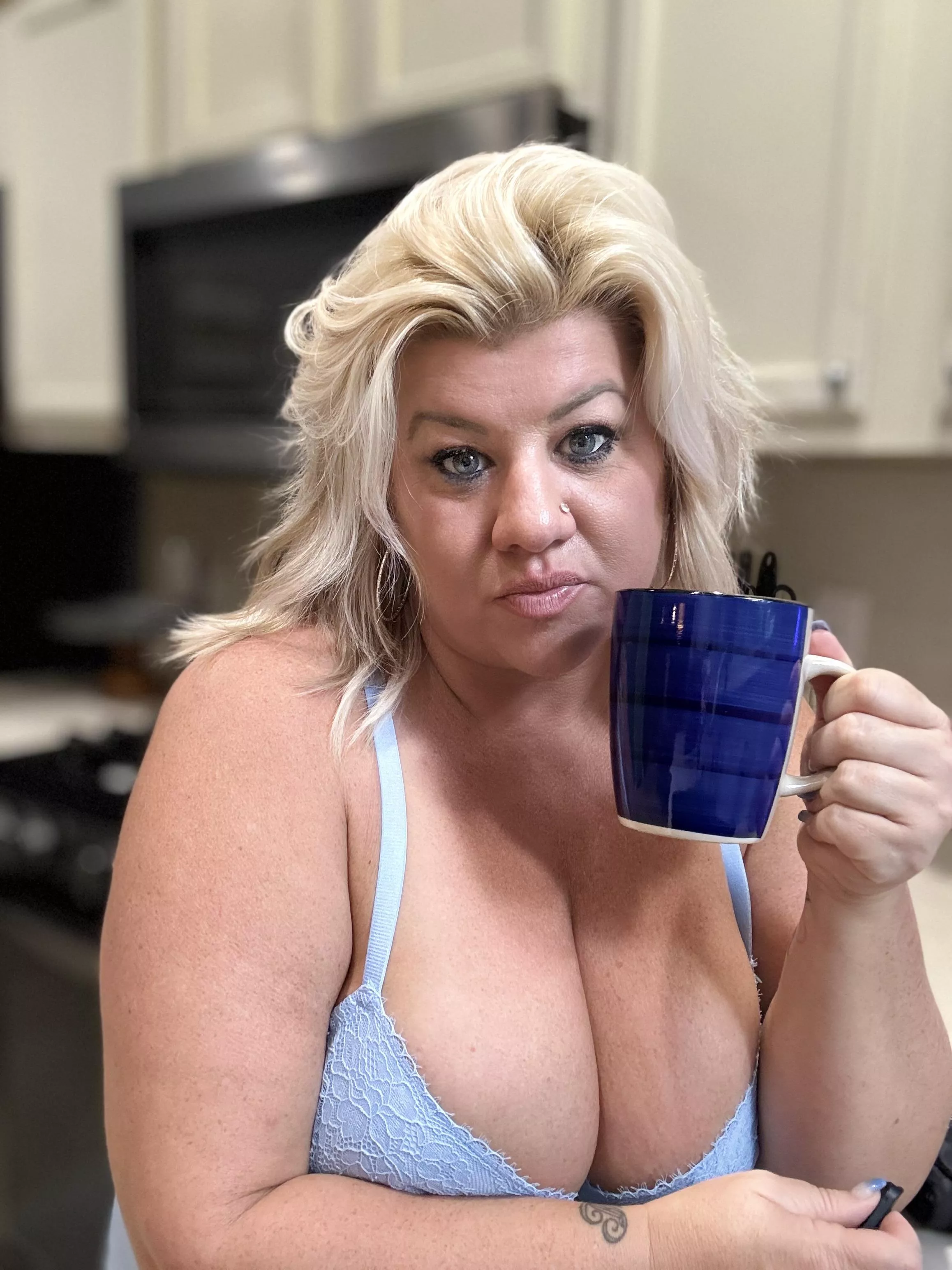 A cup of coffee and bread full of love for your snack.