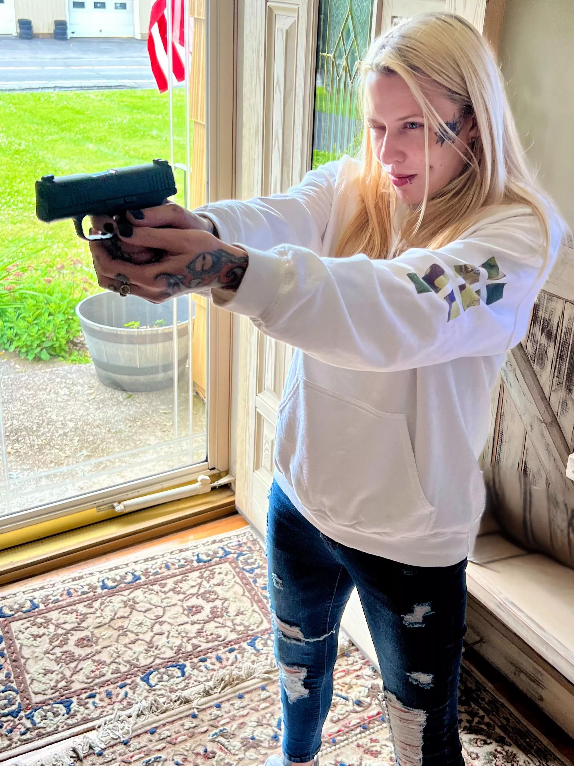 Girl who likes to handle guns 