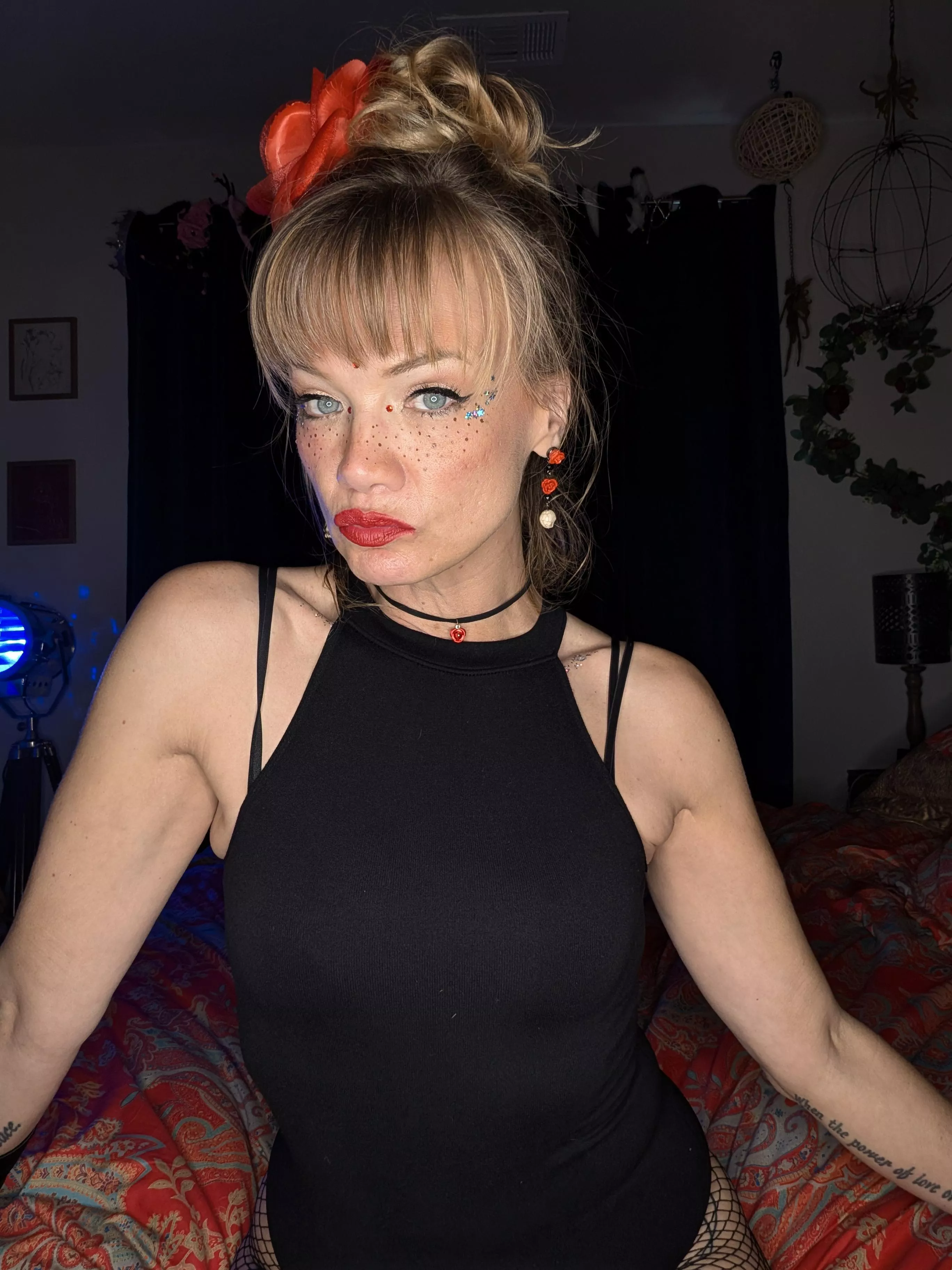 Red lips and an upturned nose