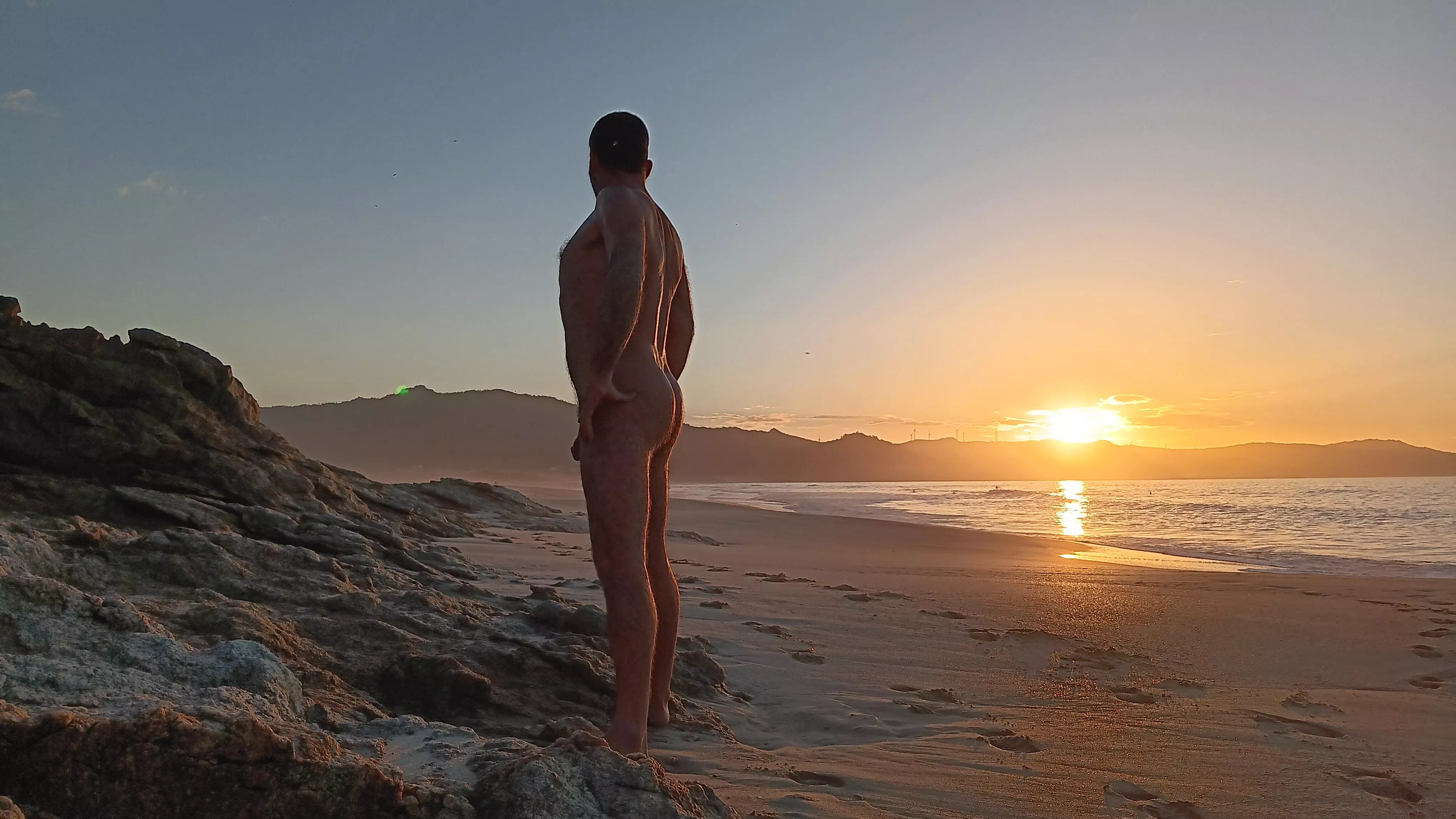 Sunset nude beach. Autumn time
