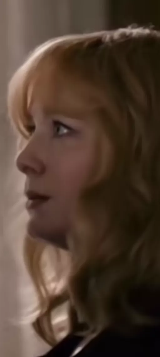 Anyone know who's she?