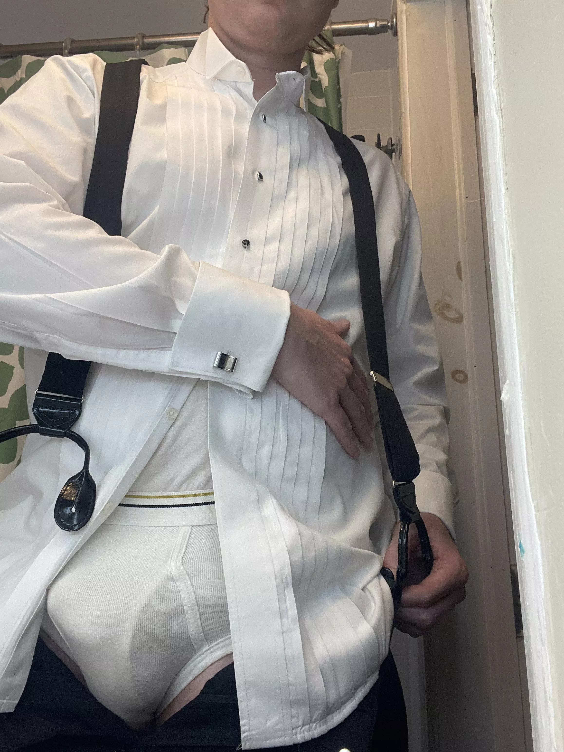 can someone help me with my suspenders?