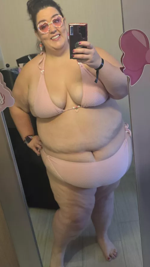 Cutie in a pink string bikini 