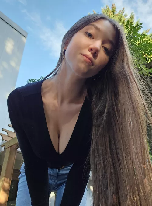 Deep cleavage and long hair
