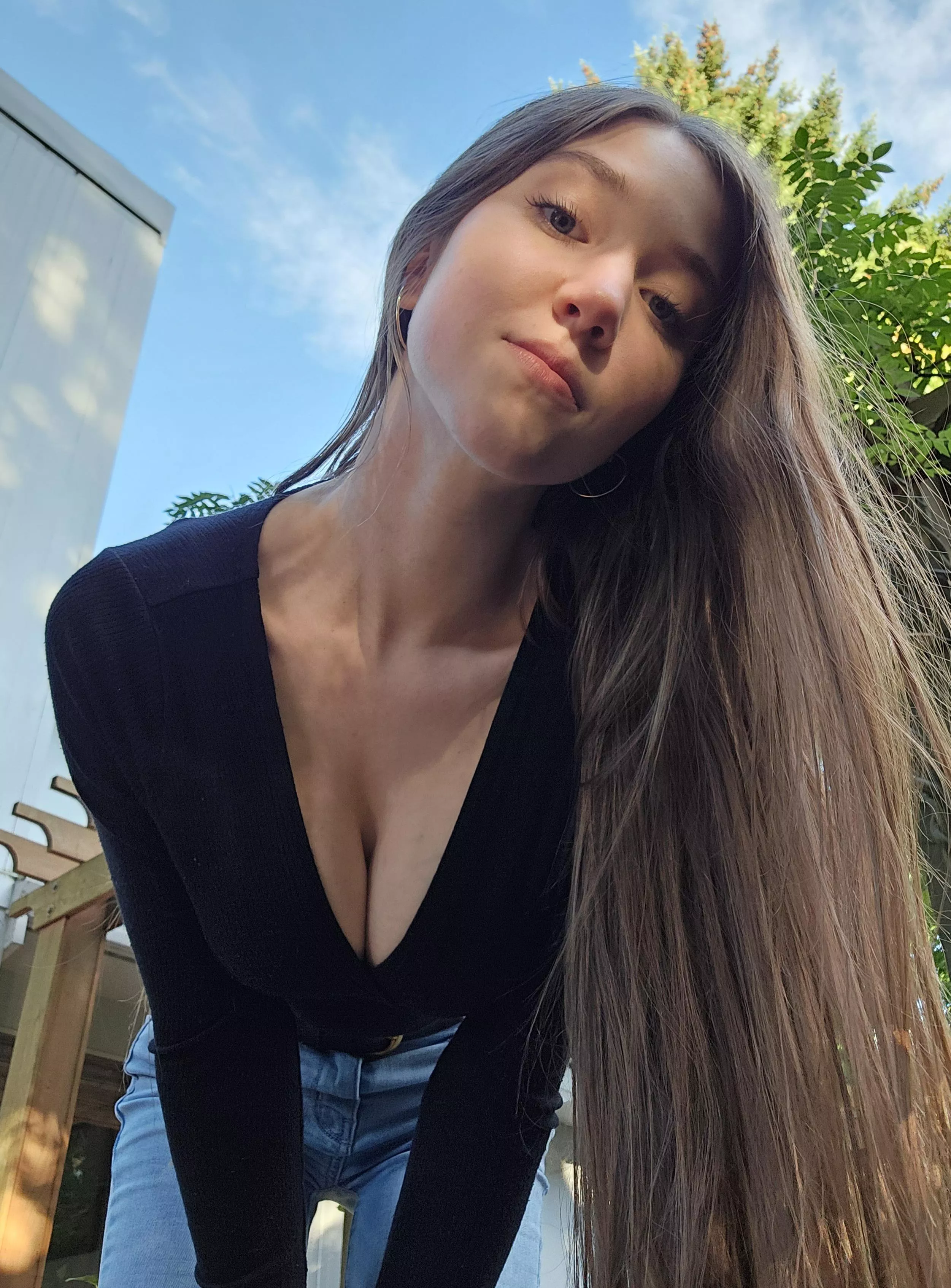 Deep cleavage and long hair