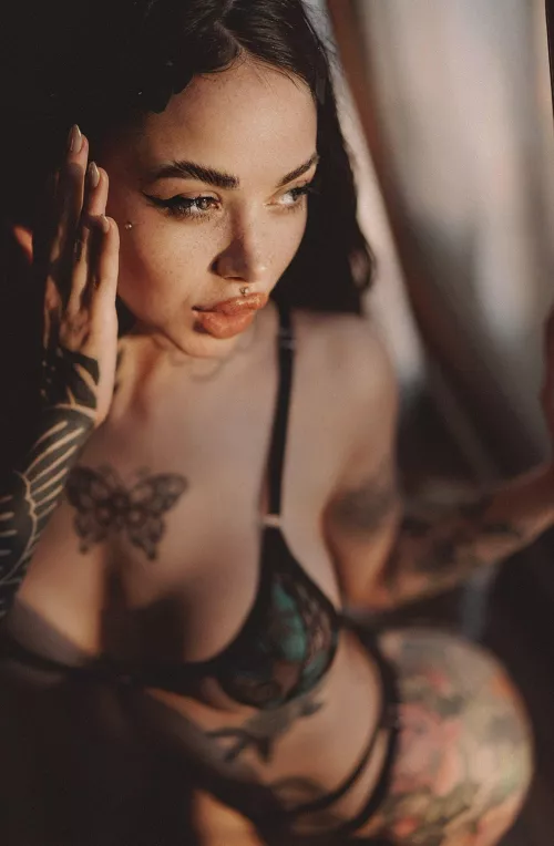 piercing and tattoos make me look even hotter