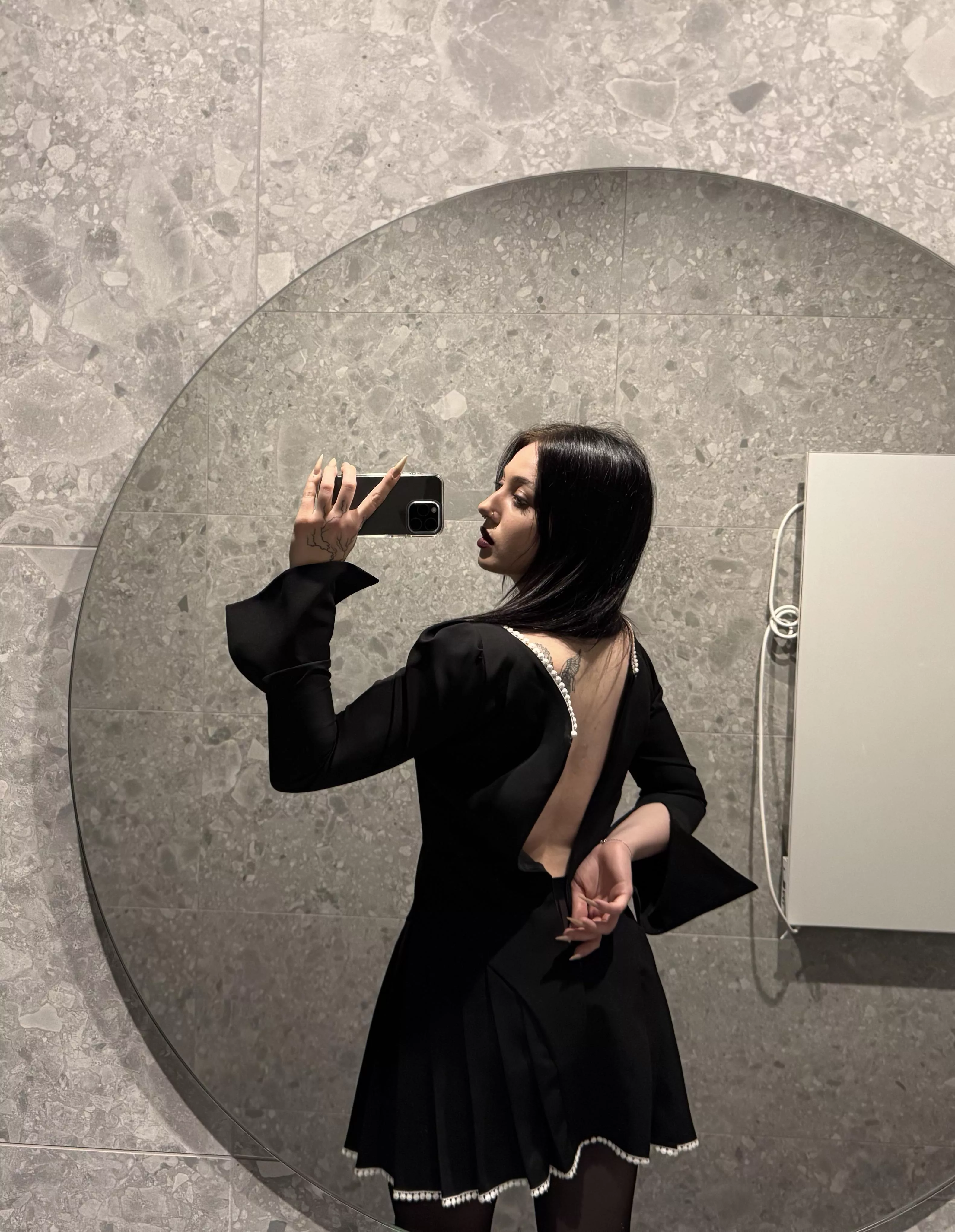 you need to take off the dress and put it on the bed and then it's just a matter of technique