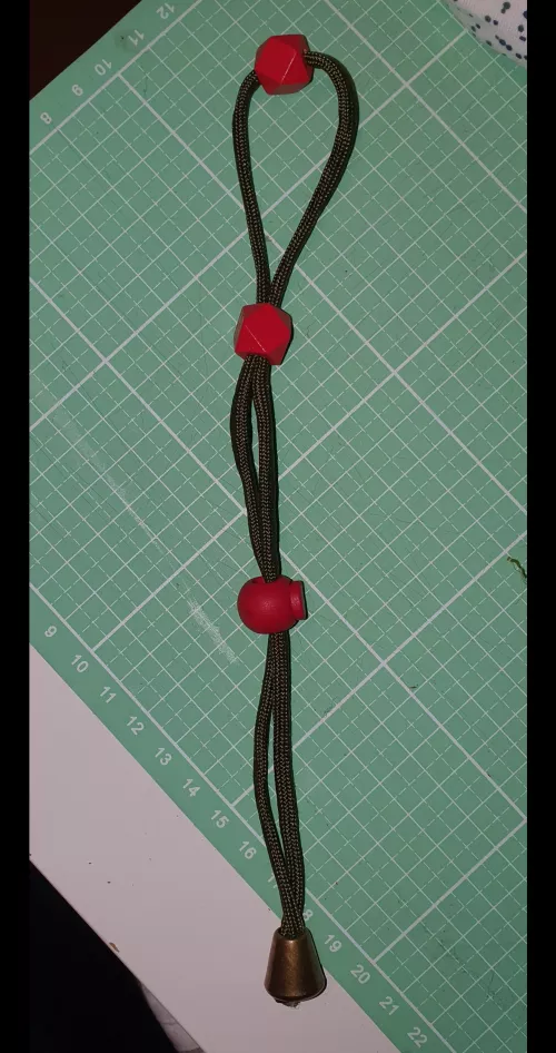 simple Paracord Ball-Cock-Ring in Christmas Color scheme