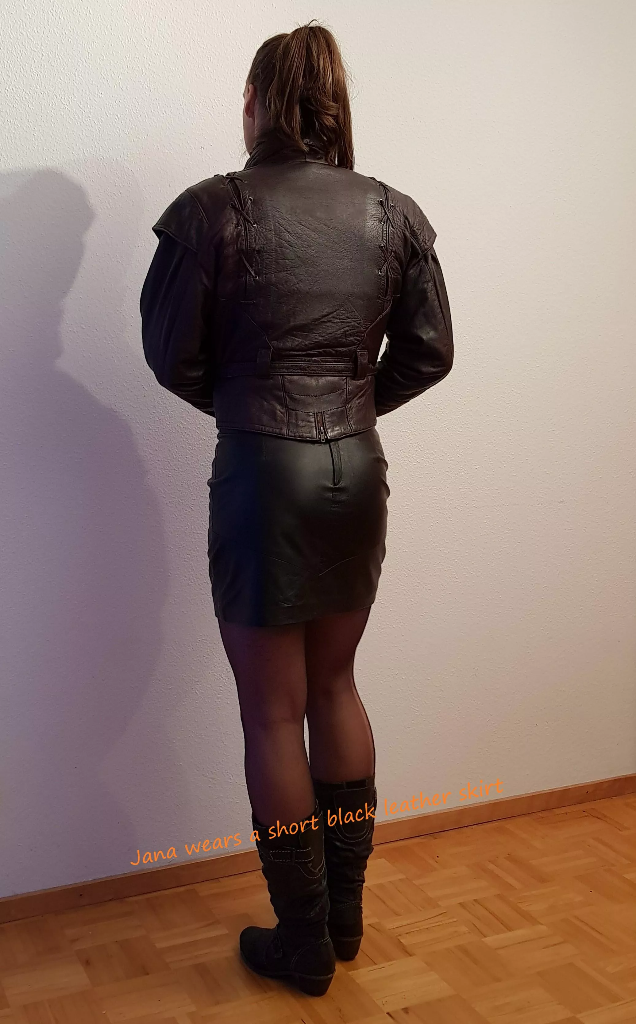 Sweet Jana teases in a tight black leather mini skirt