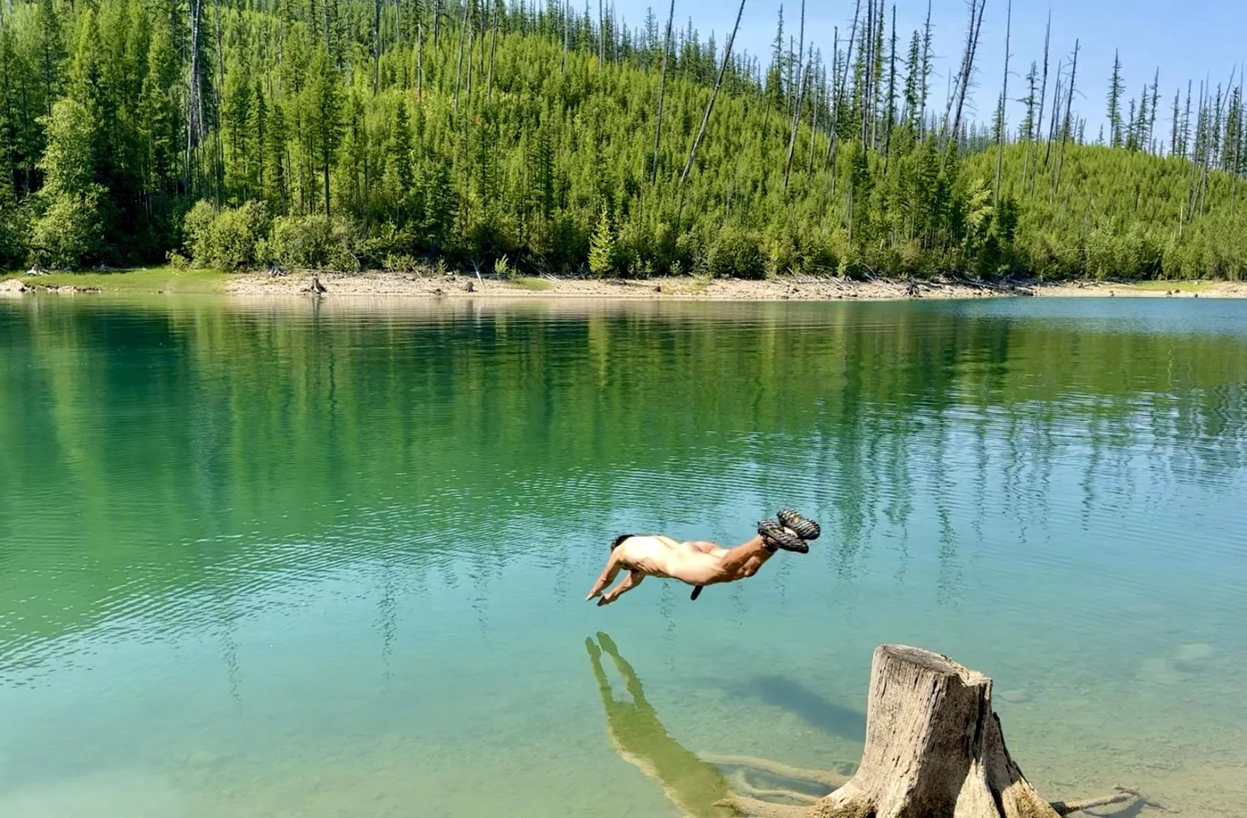 Taking a dip in a lake. 