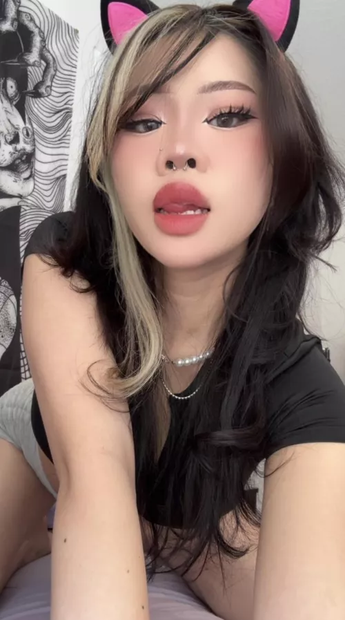 this cat girl is looking for a new master...