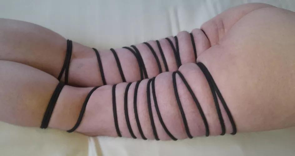 Black rope legs tied 