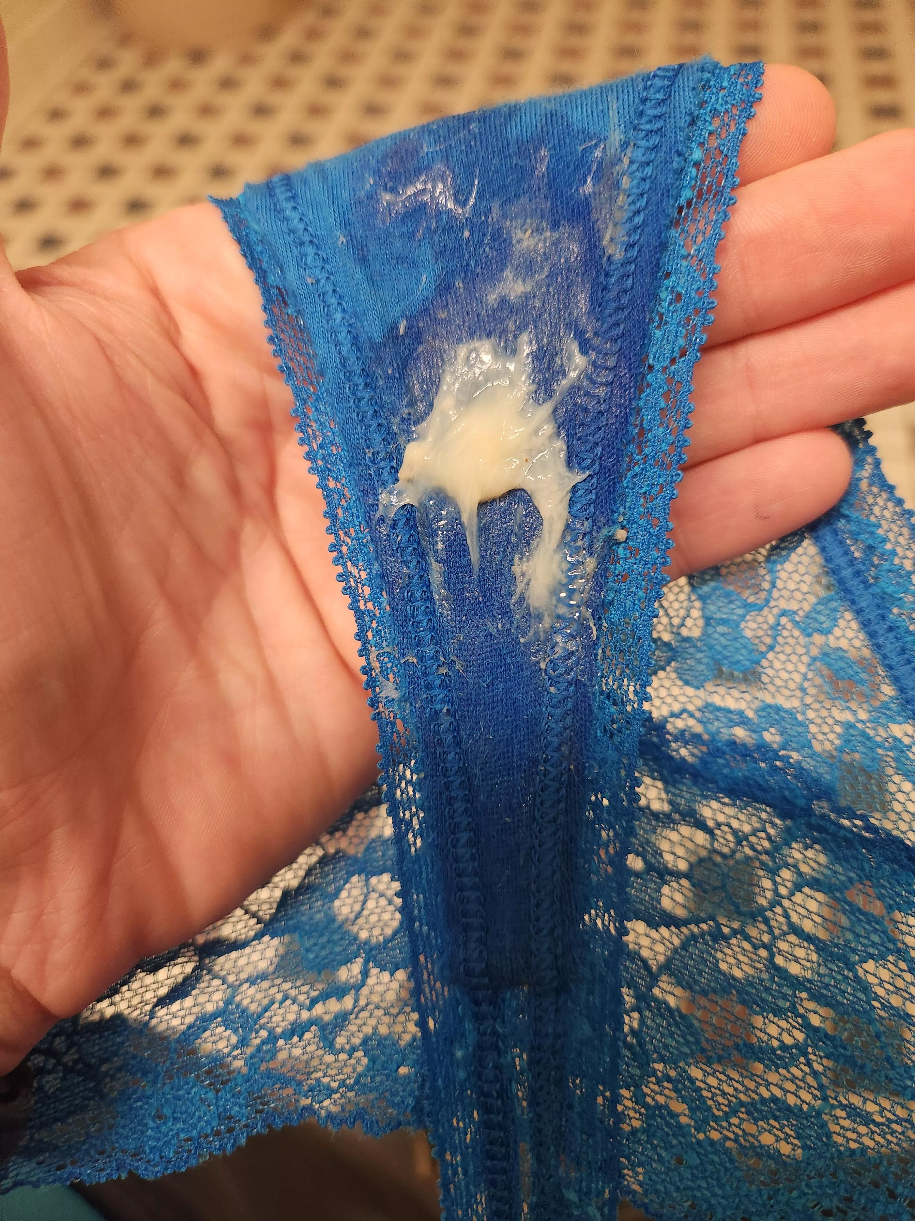 Blue VS corseted lace thong for your mouth, pre-creamed