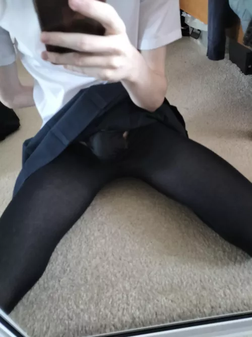 Dressed up as a slutty school girl for halloween. Like my bulge? 